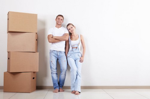 House removals team preparing a move in Ravenscourtpark street setting