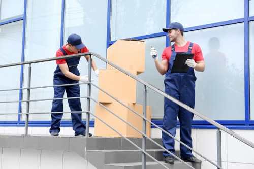 Man And Van Ravenscourtpark team sorting recyclable household items responsibly