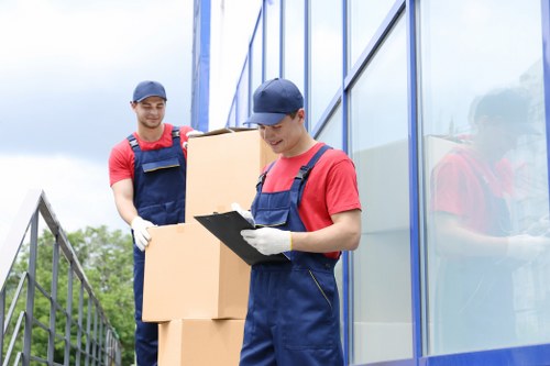Student removals service in Ravenscourtpark with moving boxes and packed items