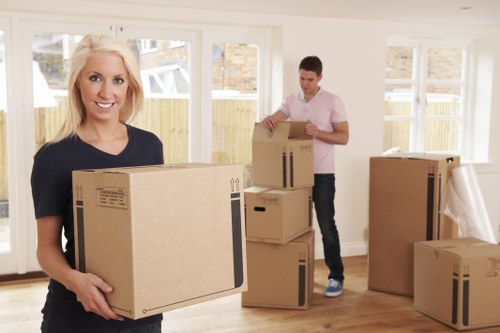 Professional movers handling household furniture removals in Ravenscourtpark