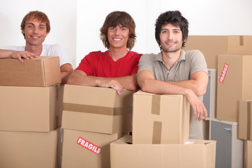 Trained staff handling furniture safely during a man and van service