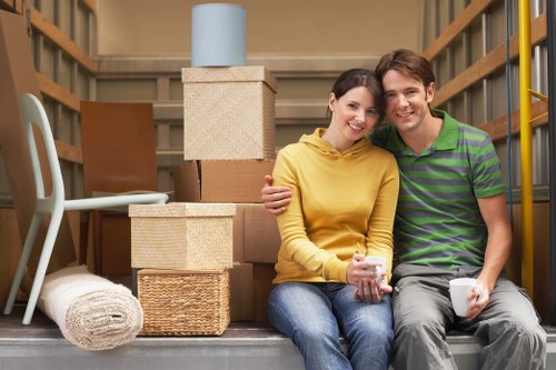 Professional student movers handling furniture for a Ravenscourtpark relocation