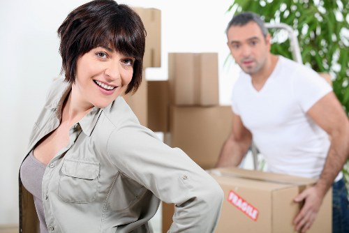 Organised moving boxes labelled for a smooth Ravenscourtpark transfer