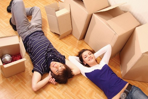 Packed boxes being loaded into a removal van