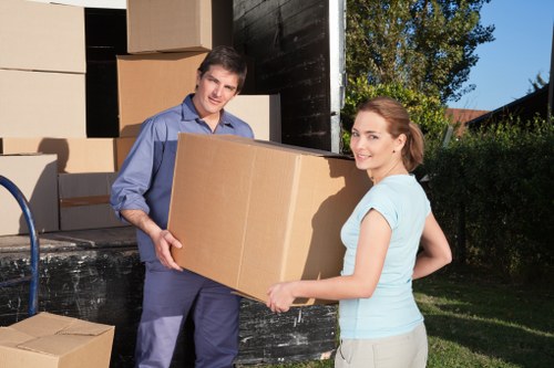 Ravenscourt Park moving service loading furniture and boxes with care